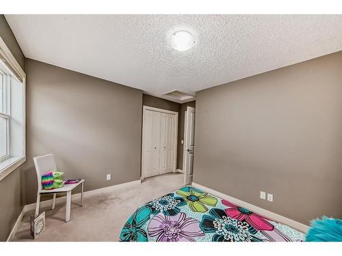 55 Evansview Park Nw, Calgary, AB - Indoor Photo Showing Bedroom