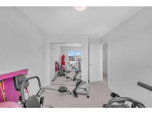 258 Chelsea Place Place, Chestermere, AB - Indoor Photo Showing Gym Room