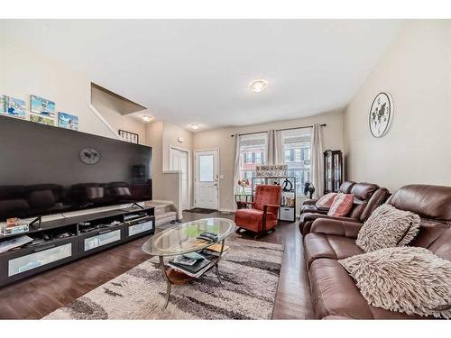 1104-1001 8 Street Nw, Airdrie, AB - Indoor Photo Showing Living Room