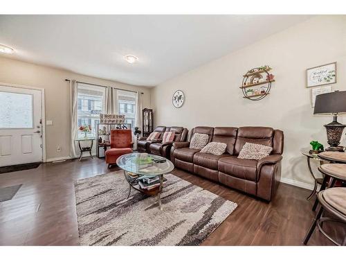 1104-1001 8 Street Nw, Airdrie, AB - Indoor Photo Showing Living Room