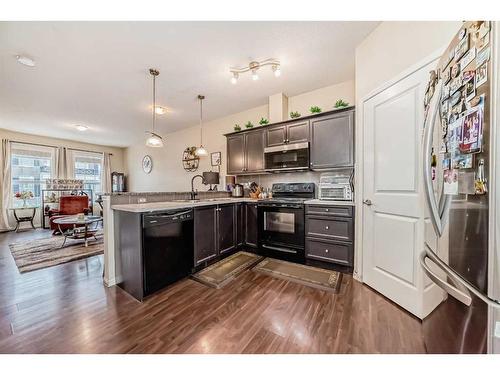 1104-1001 8 Street Nw, Airdrie, AB - Indoor Photo Showing Kitchen With Upgraded Kitchen