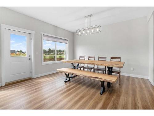 1328 Lackner Boulevard, Carstairs, AB - Indoor Photo Showing Dining Room