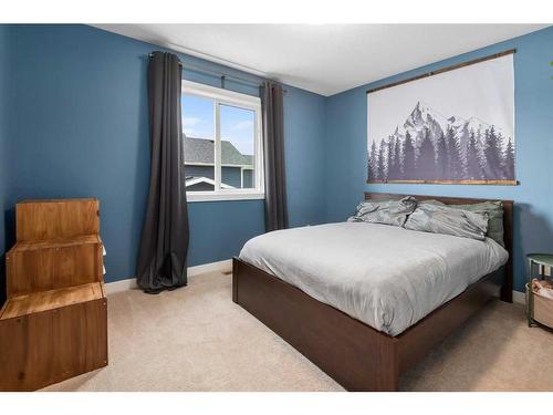 1328 Lackner Boulevard, Carstairs, AB - Indoor Photo Showing Bedroom