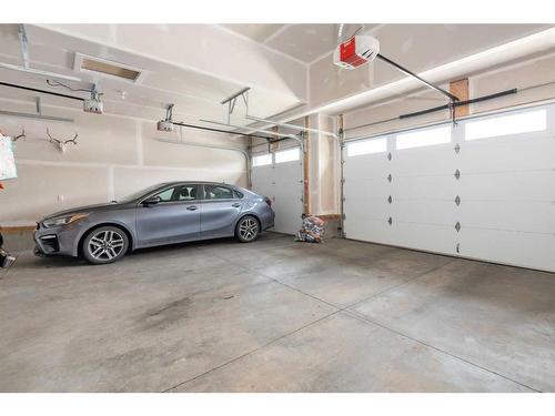 1328 Lackner Boulevard, Carstairs, AB - Indoor Photo Showing Garage