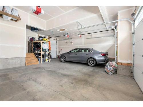 1328 Lackner Boulevard, Carstairs, AB - Indoor Photo Showing Garage