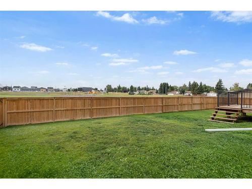 1328 Lackner Boulevard, Carstairs, AB - Outdoor With Backyard