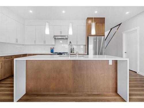 1328 Lackner Boulevard, Carstairs, AB - Indoor Photo Showing Kitchen