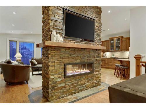 831 Millar Road Ne, Calgary, AB - Indoor Photo Showing Living Room With Fireplace