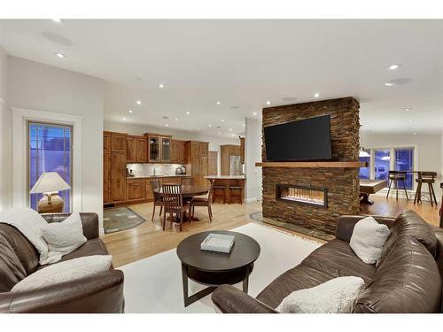 831 Millar Road Ne, Calgary, AB - Indoor Photo Showing Living Room With Fireplace