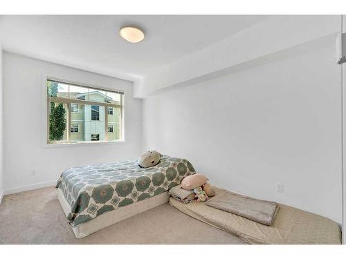 311-22 Auburn Bay Link Se, Calgary, AB - Indoor Photo Showing Bedroom