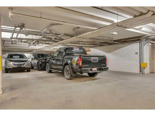 311-22 Auburn Bay Link Se, Calgary, AB - Indoor Photo Showing Garage