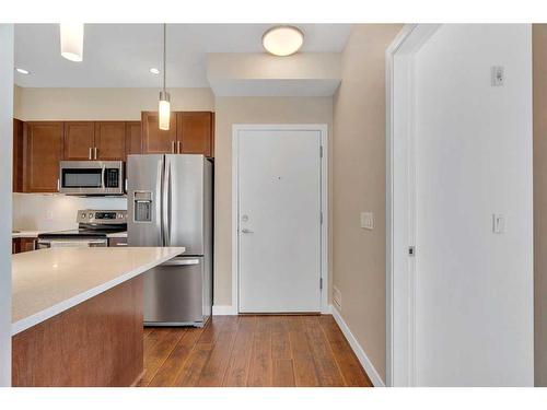 311-22 Auburn Bay Link Se, Calgary, AB - Indoor Photo Showing Kitchen With Stainless Steel Kitchen