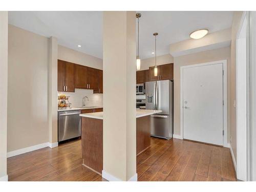 311-22 Auburn Bay Link Se, Calgary, AB - Indoor Photo Showing Kitchen With Stainless Steel Kitchen