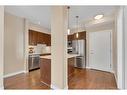 311-22 Auburn Bay Link Se, Calgary, AB  - Indoor Photo Showing Kitchen With Stainless Steel Kitchen 