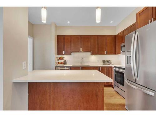 311-22 Auburn Bay Link Se, Calgary, AB - Indoor Photo Showing Kitchen With Stainless Steel Kitchen