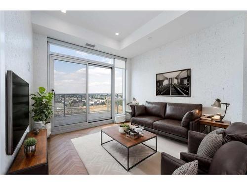 705-8505 Broadcast Avenue Sw, Calgary, AB - Indoor Photo Showing Living Room