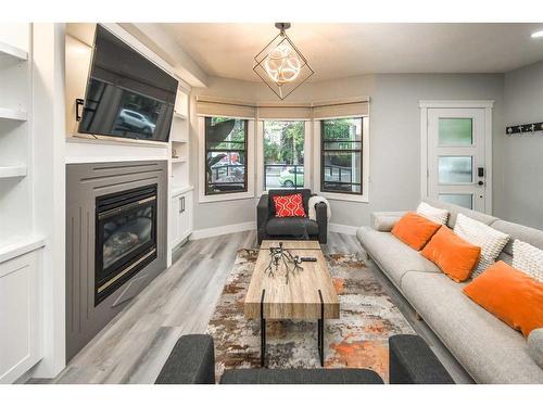 322 22 Avenue Sw, Calgary, AB - Indoor Photo Showing Living Room With Fireplace