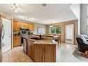 1240 Everridge Drive Sw, Calgary, AB  - Indoor Photo Showing Kitchen With Double Sink 