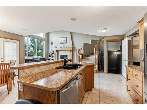 1240 Everridge Drive Sw, Calgary, AB - Indoor Photo Showing Kitchen With Double Sink