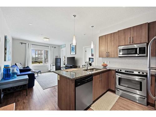 2-12 Sage Hill Terrace Nw, Calgary, AB - Indoor Photo Showing Kitchen With Double Sink With Upgraded Kitchen