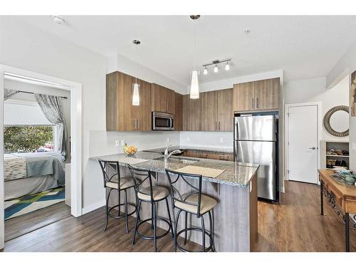 2-12 Sage Hill Terrace Nw, Calgary, AB - Indoor Photo Showing Kitchen With Double Sink