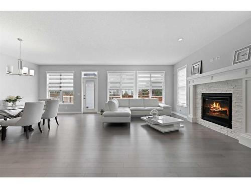 4 Mahogany Park Se, Calgary, AB - Indoor Photo Showing Living Room With Fireplace