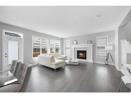 4 Mahogany Park Se, Calgary, AB - Indoor Photo Showing Living Room With Fireplace