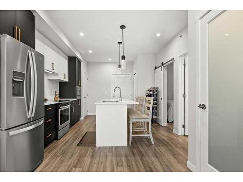 505-138 Sage Valley Common Nw, Calgary, AB - Indoor Photo Showing Kitchen With Upgraded Kitchen