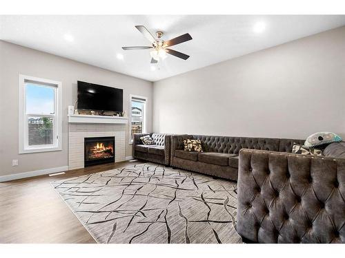 156 Cornerbrook Common Ne, Calgary, AB - Indoor Photo Showing Living Room With Fireplace