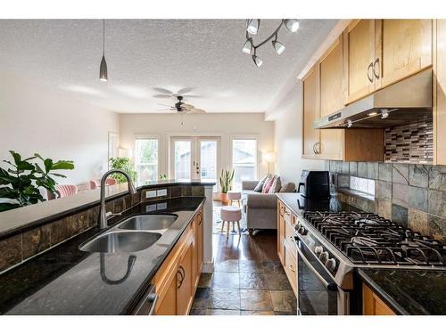 1203 18 Avenue Nw, Calgary, AB - Indoor Photo Showing Kitchen With Double Sink