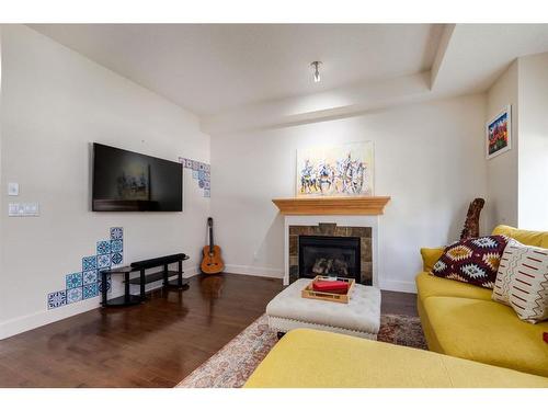 1203 18 Avenue Nw, Calgary, AB - Indoor Photo Showing Living Room With Fireplace