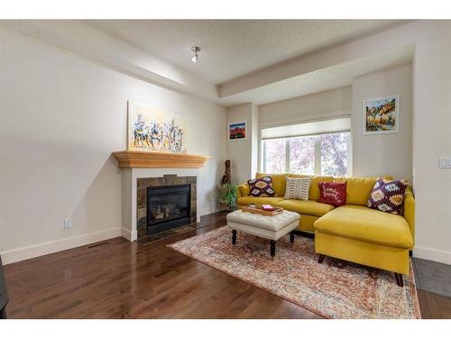 1203 18 Avenue Nw, Calgary, AB - Indoor Photo Showing Living Room With Fireplace