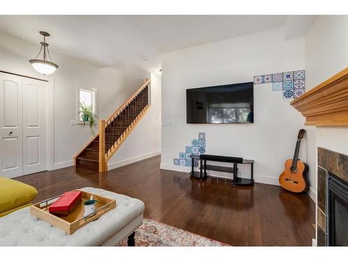 1203 18 Avenue Nw, Calgary, AB - Indoor Photo Showing Living Room With Fireplace