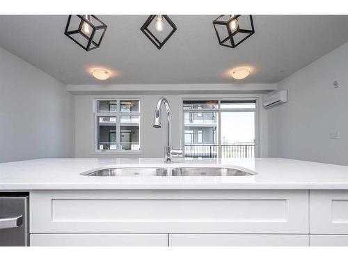 5216-200 Seton Circle Se, Calgary, AB - Indoor Photo Showing Kitchen With Double Sink