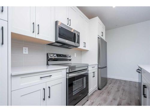 5216-200 Seton Circle Se, Calgary, AB - Indoor Photo Showing Kitchen With Stainless Steel Kitchen With Upgraded Kitchen