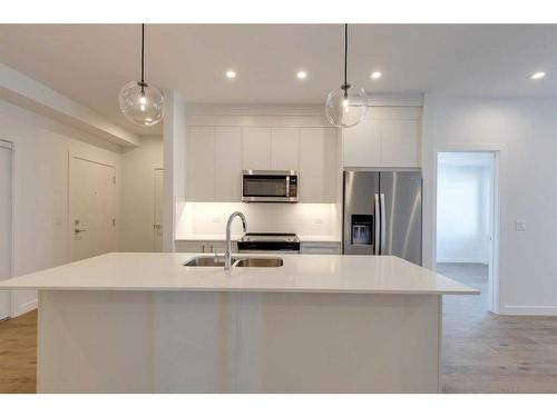 2309-395 Skyview Parkway Ne, Calgary, AB - Indoor Photo Showing Kitchen With Stainless Steel Kitchen With Double Sink With Upgraded Kitchen