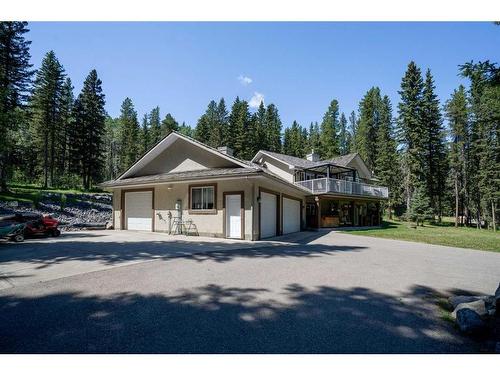 333 Wild Rose Close, Rural Rocky View County, AB - Outdoor With Deck Patio Veranda With Facade