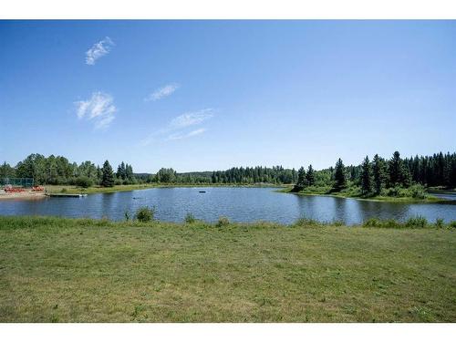 333 Wild Rose Close, Rural Rocky View County, AB - Outdoor With Body Of Water With View