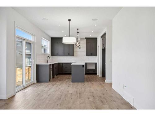 235 Dawson Harbour Court, Chestermere, AB - Indoor Photo Showing Kitchen