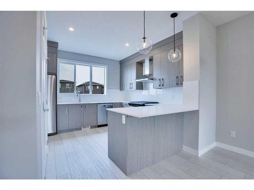 465 Chelsea Key, Chestermere, AB - Indoor Photo Showing Kitchen With Upgraded Kitchen