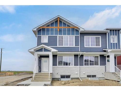 465 Chelsea Key, Chestermere, AB - Outdoor With Facade