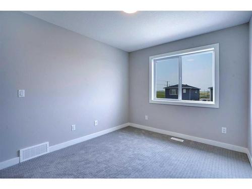 465 Chelsea Key, Chestermere, AB - Indoor Photo Showing Other Room