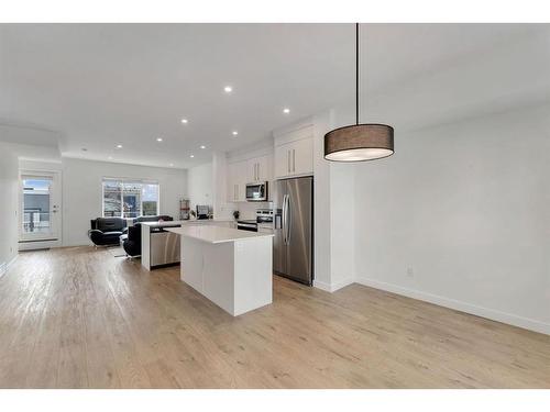 404-669 Savanna Boulevard Ne, Calgary, AB - Indoor Photo Showing Kitchen With Stainless Steel Kitchen