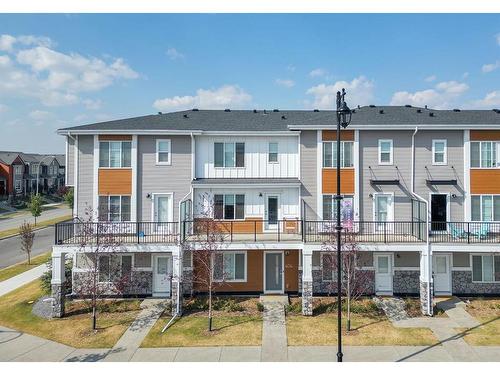 404-669 Savanna Boulevard Ne, Calgary, AB - Outdoor With Balcony With Facade