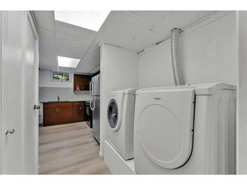 76 Huntmeadow Road Ne, Calgary, AB - Indoor Photo Showing Laundry Room