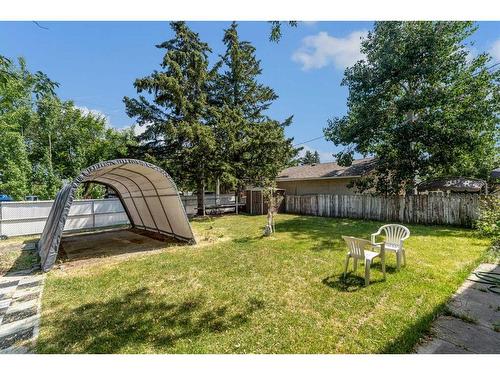 76 Huntmeadow Road Ne, Calgary, AB - Outdoor With Backyard