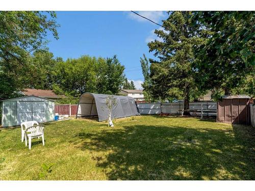 76 Huntmeadow Road Ne, Calgary, AB - Outdoor With Backyard