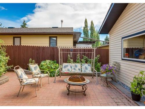 56 Glenwood Place, Cochrane, AB - Outdoor With Deck Patio Veranda With Exterior