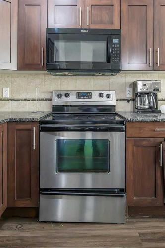 108-5110 36 Street, Red Deer, AB - Indoor Photo Showing Kitchen With Stainless Steel Kitchen