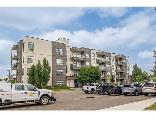 108-5110 36 Street, Red Deer, AB - Outdoor With Balcony With Facade